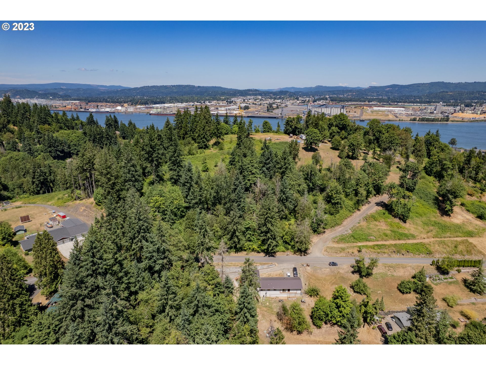 Debast Road Rainier, OR 97048 - Photo 8 of 16 a view of an outdoor space with a lake view