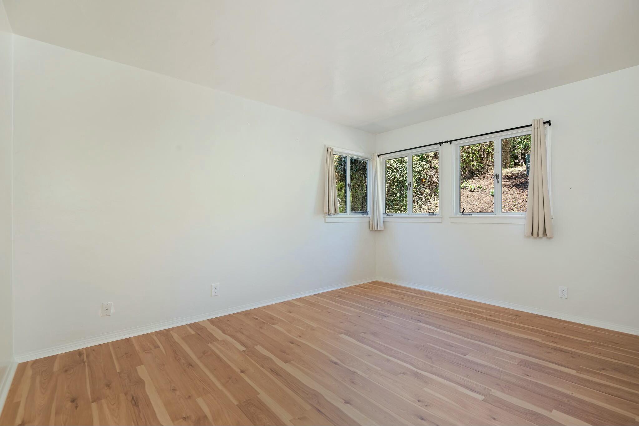 2986 Kenmore Place Santa Barbara, CA 93105 - Photo 11 of 49 a view of empty room with wooden floor
