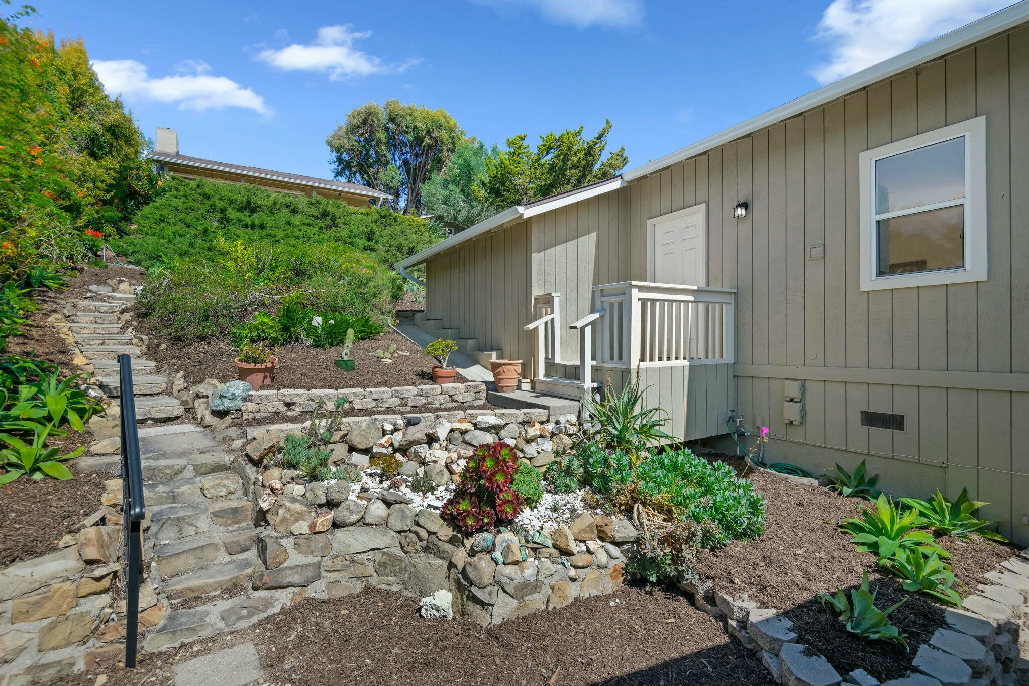 2986 Kenmore Place Santa Barbara, CA 93105 - Photo 37 of 49 a backyard of a house with lots of green space