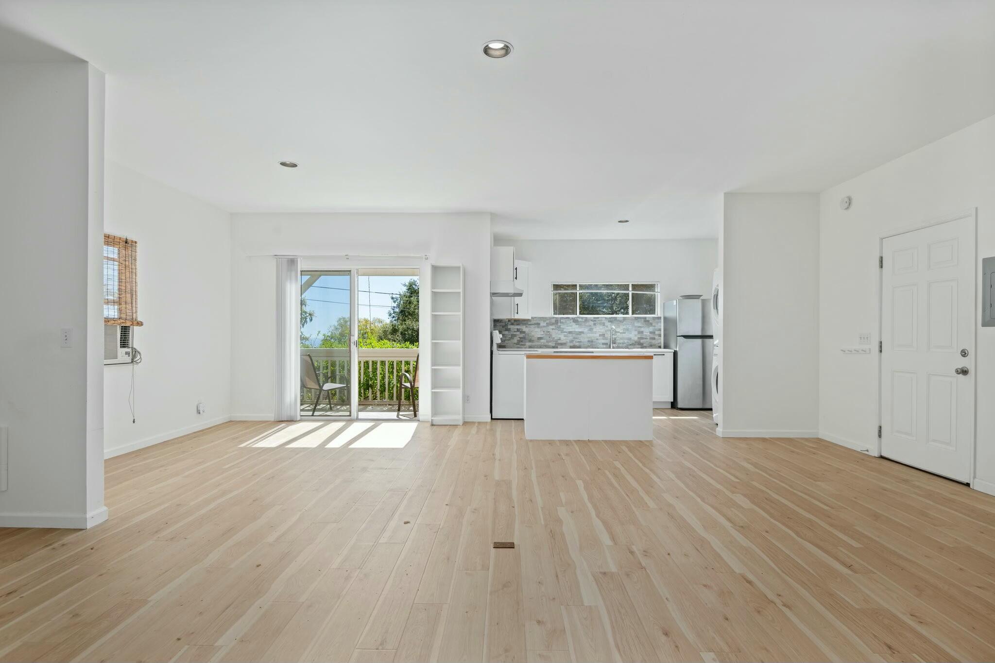 2986 Kenmore Place Santa Barbara, CA 93105 - Photo 40 of 49 a view of empty room with wooden floor and window
