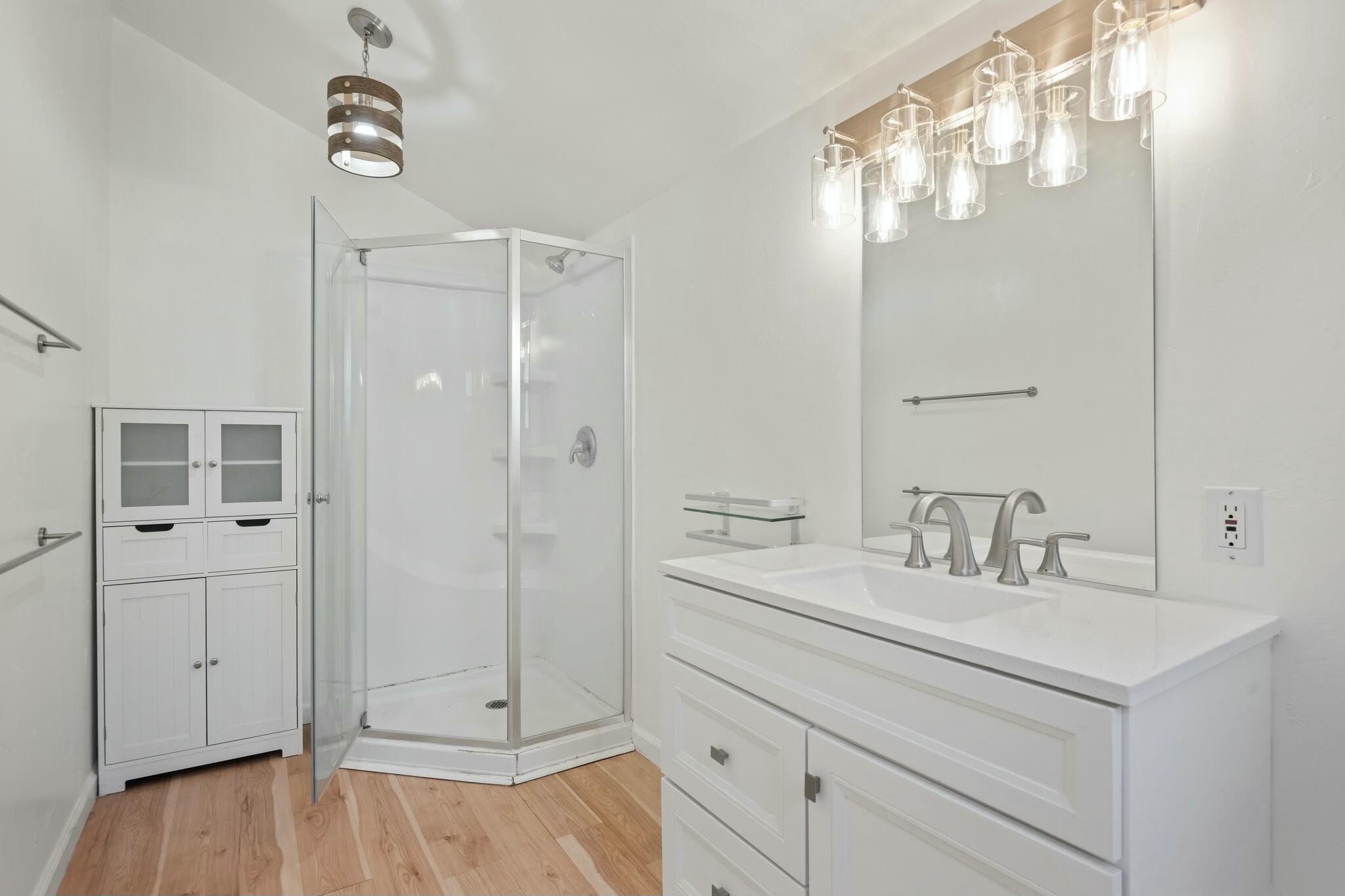 2986 Kenmore Place Santa Barbara, CA 93105 - Photo 45 of 49 a bathroom with a double vanity sink mirror and shower