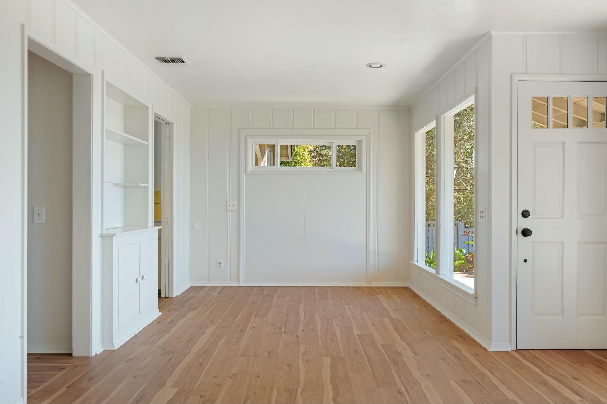 2986 Kenmore Place Santa Barbara, CA 93105 - Photo 8 of 49 a view of an empty room with wooden floor and a window