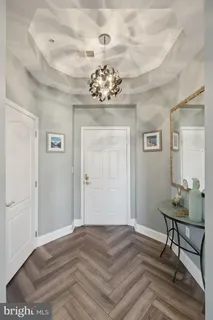 a bedroom with a bed and a table