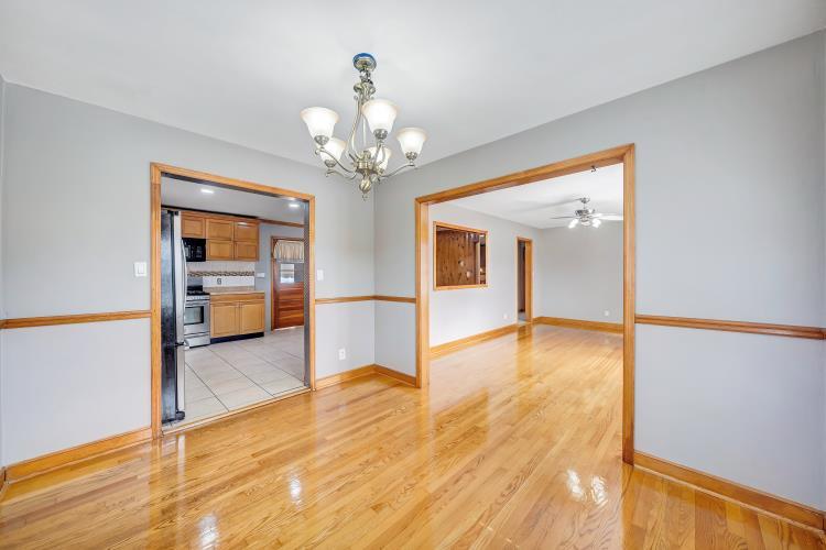 5001 Hildebrand Road Northwest Roanoke, VA 24012 - Photo 13 of 36 a view of a room with wooden floor and kitchen view