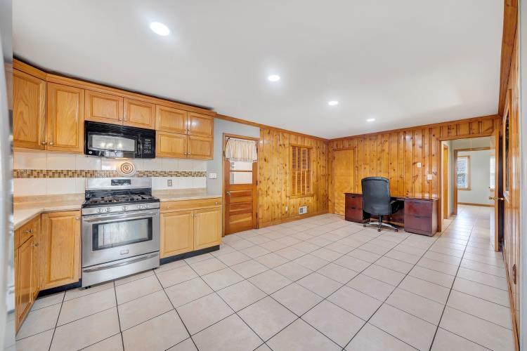 5001 Hildebrand Road Northwest Roanoke, VA 24012 - Photo 18 of 36 a kitchen with stainless steel appliances a stove top oven and a refrigerator