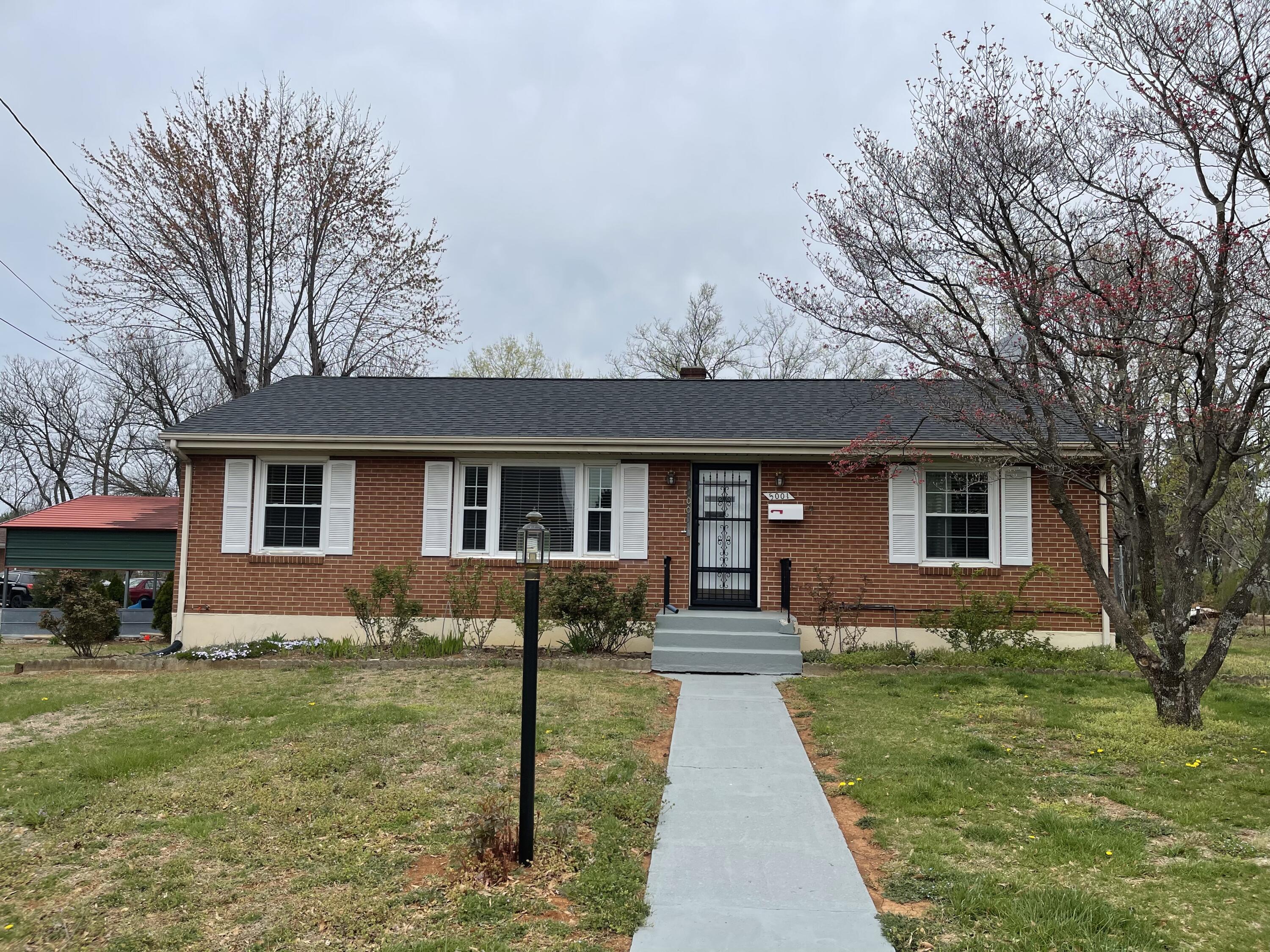 5001 Hildebrand Road Northwest Roanoke, VA 24012 - Photo 2 of 36 a front view of house with yard and green space
