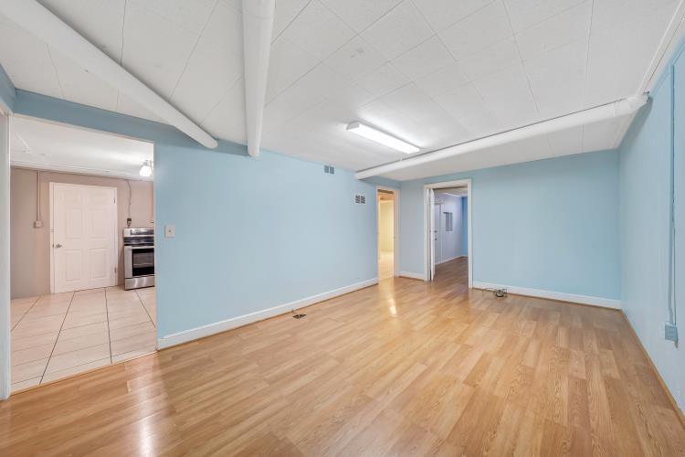 5001 Hildebrand Road Northwest Roanoke, VA 24012 - Photo 30 of 36 a view of an empty room and wooden floor