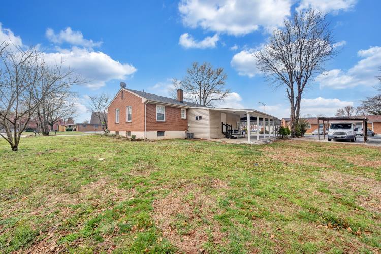 5001 Hildebrand Road Northwest Roanoke, VA 24012 - Photo 3 of 36 a front view of a house with garden