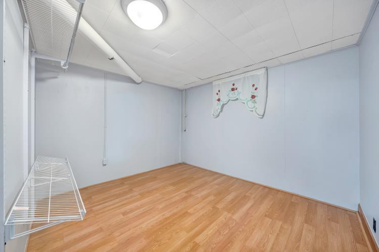 5001 Hildebrand Road Northwest Roanoke, VA 24012 - Photo 32 of 36 a view of a room with wooden floor and white walls
