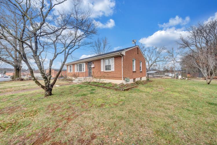 5001 Hildebrand Road Northwest Roanoke, VA 24012 - Photo 4 of 36 a view of a house with a yard