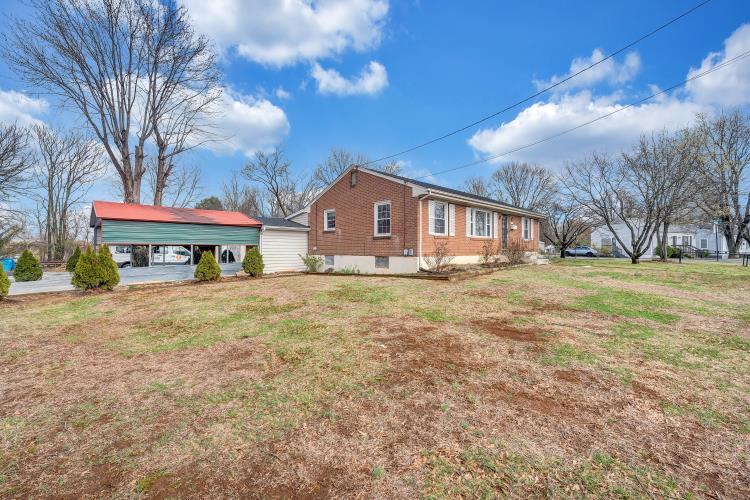 5001 Hildebrand Road Northwest Roanoke, VA 24012 - Photo 8 of 36 a front view of a house with garden