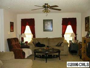 5205 Elizabeth Road Charlotte, NC 28269 - Photo 3 of 8 a living room with furniture and a window