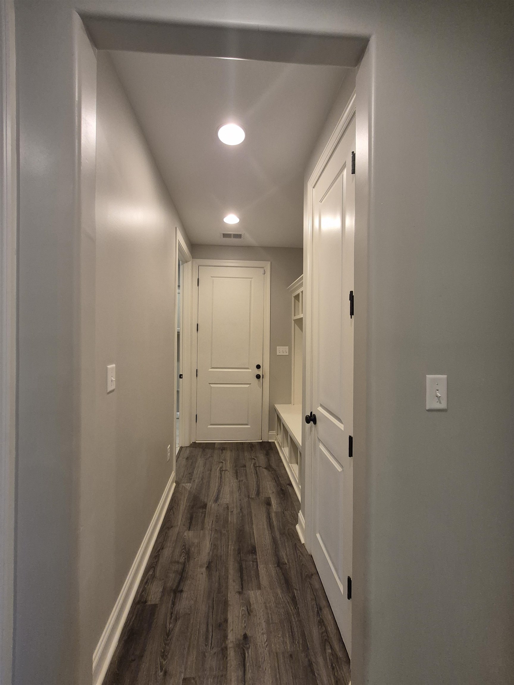 5120 Moudry Lane Lakeland, TN 38002 - Photo 15 of 34 Hallway with recessed lighting and dark wood-style flooring