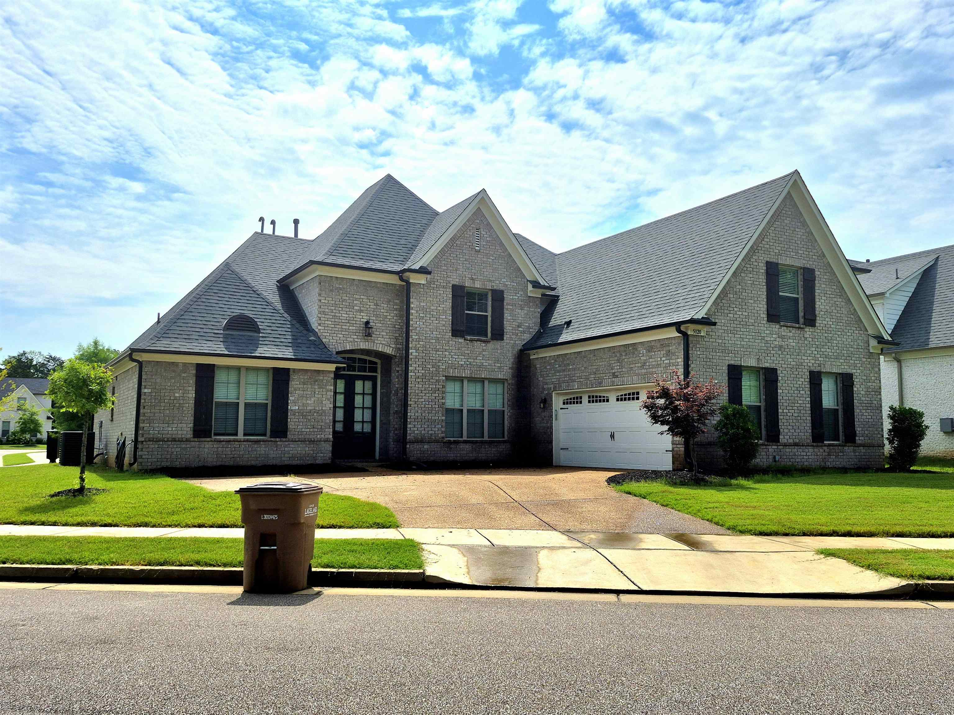 5120 Moudry Lane Lakeland, TN 38002 - Photo 2 of 34 a front view of house with yard and green space