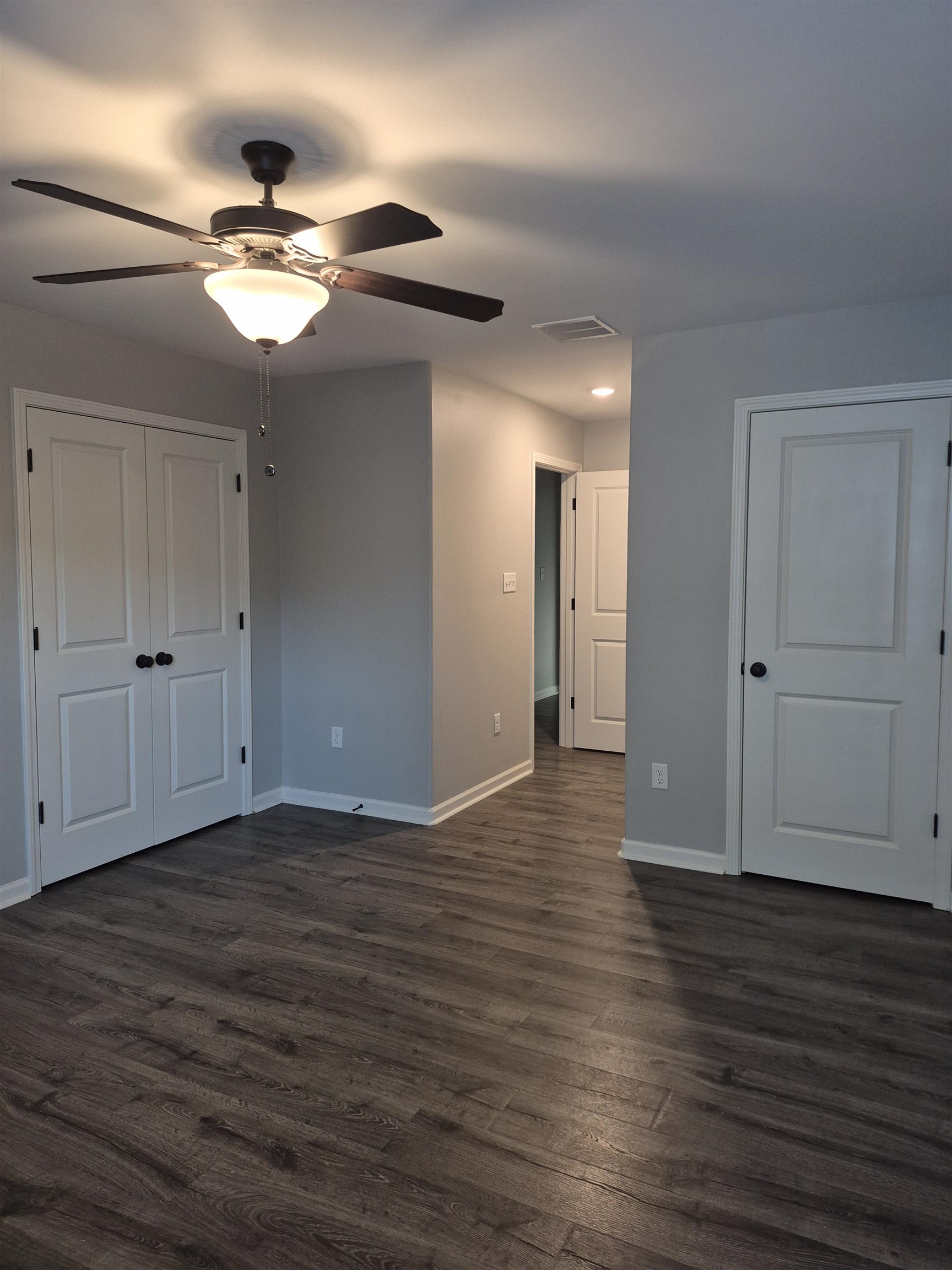 5120 Moudry Lane Lakeland, TN 38002 - Photo 27 of 34 a view of an empty room with wooden floor