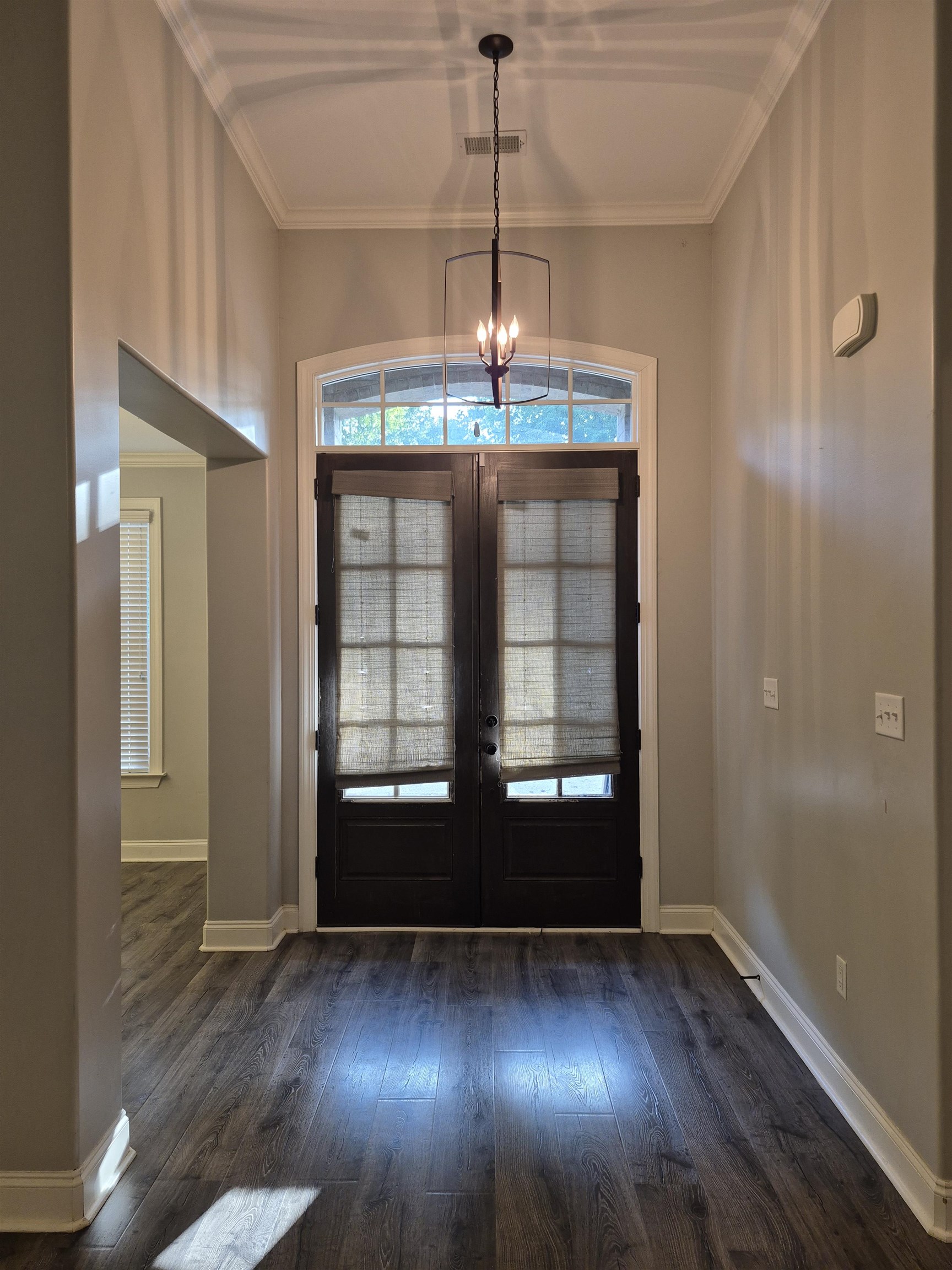 5120 Moudry Lane Lakeland, TN 38002 - Photo 6 of 34 wooden floor in an empty room with a window