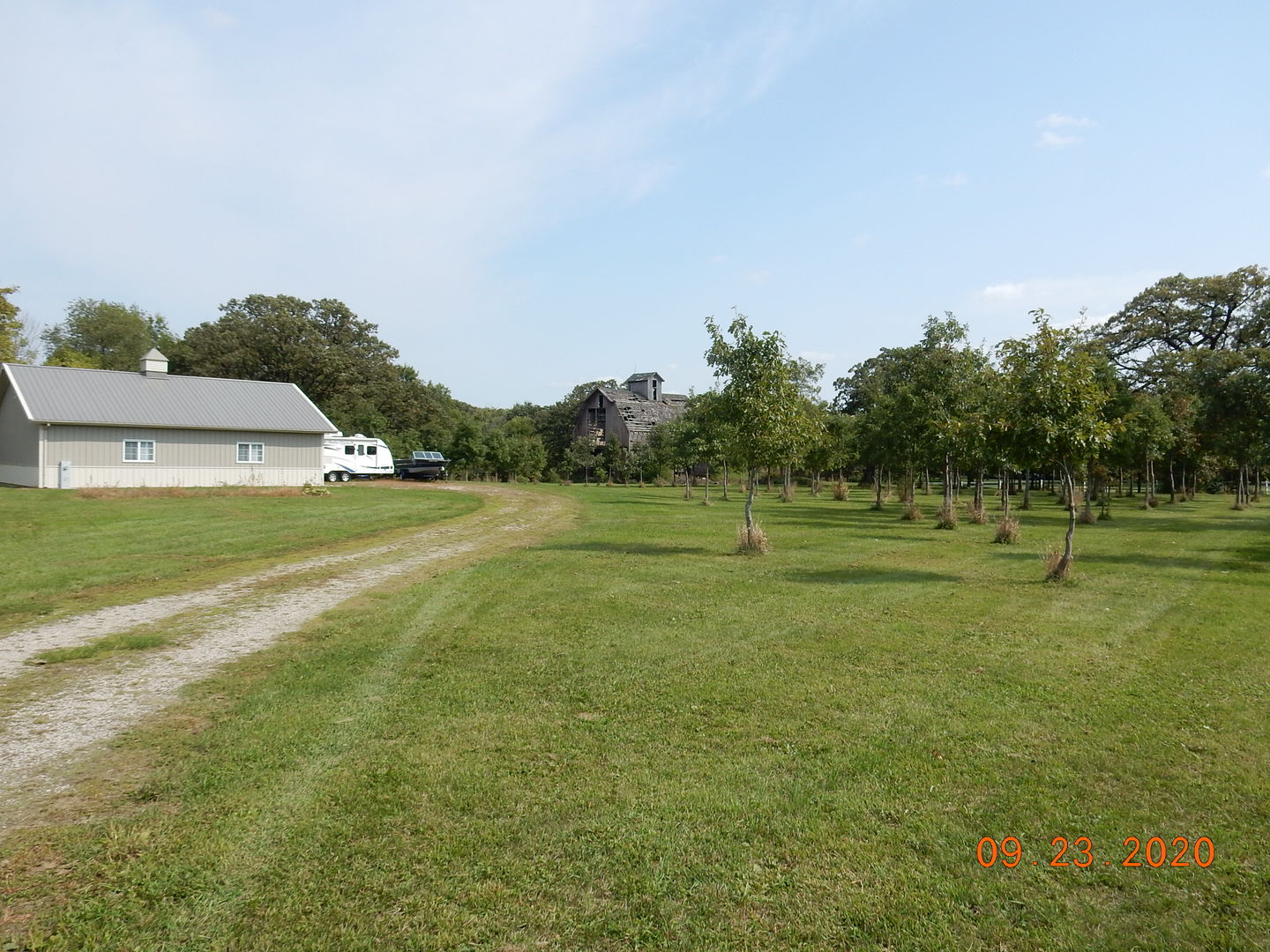 a view of a house with a big yard