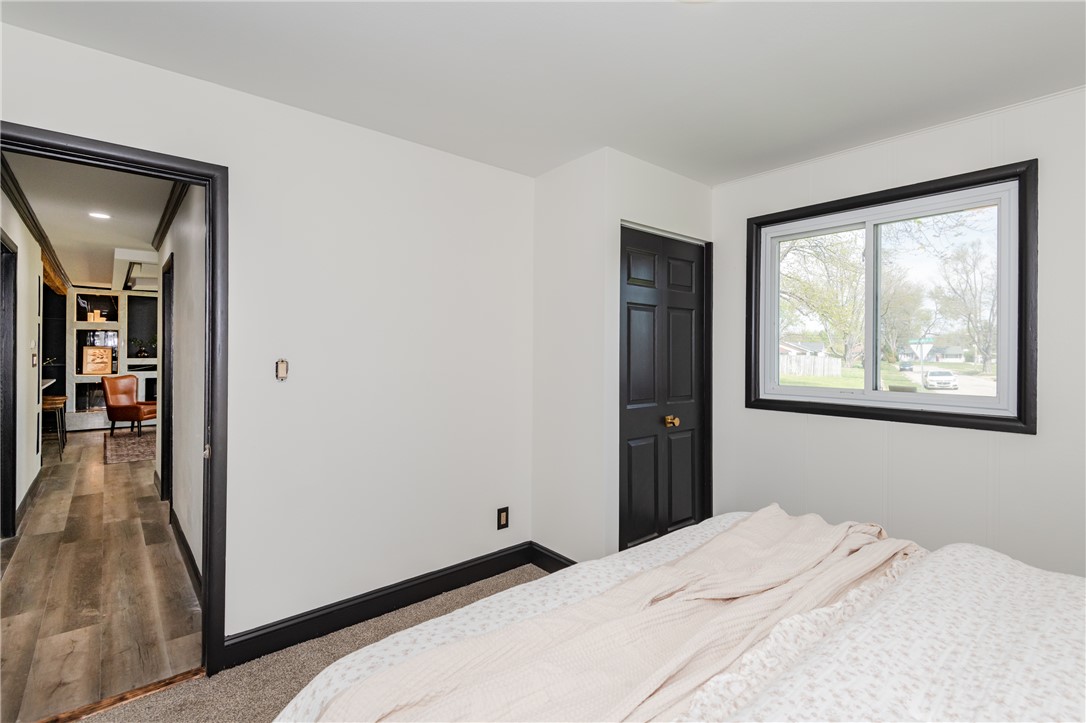 5240 Haverfield Road Dayton, OH 45432 - Photo 38 of 58 This spacious bedroom offers a bright and airy atmosphere, perfect for comfortable living.