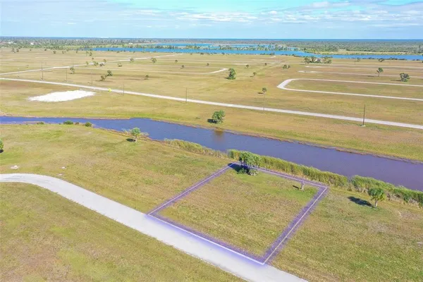 a view of an empty room and an ocean
