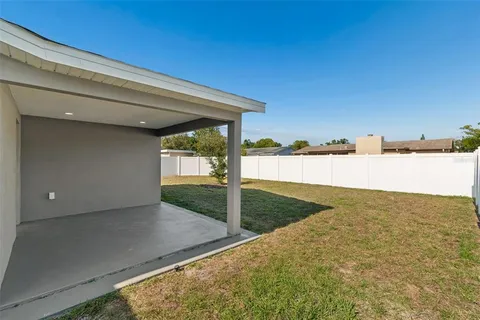 a house view with a backyard space