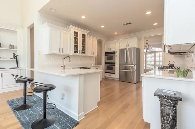 a front view of a house with parking space