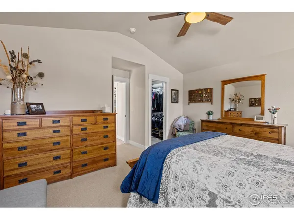 a bedroom with a bed and a cabinets