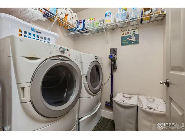 a bathroom with a sink toilet a mirror and shower