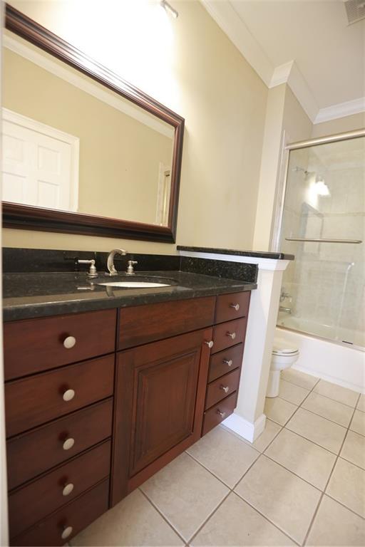 3541 Roswell Road Northeast, Unit 20 Atlanta, GA 30305 - Photo 15 of 72 a bathroom with a sink and a mirror