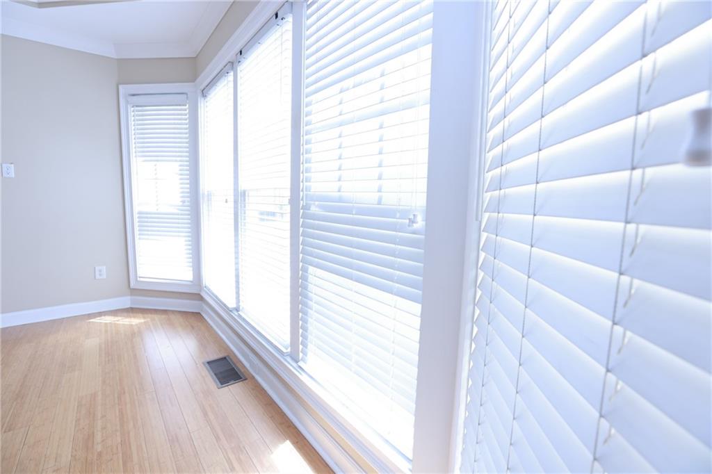 3541 Roswell Road Northeast, Unit 20 Atlanta, GA 30305 - Photo 18 of 72 a view of a wooden floor and a window