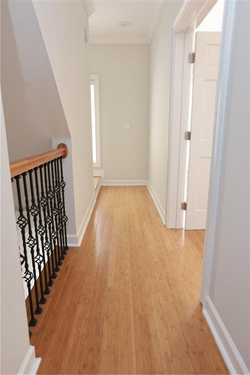 3541 Roswell Road Northeast, Unit 20 Atlanta, GA 30305 - Photo 20 of 72 a view of a hallway with wooden floor