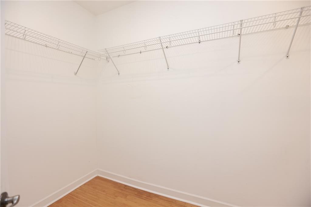 3541 Roswell Road Northeast, Unit 20 Atlanta, GA 30305 - Photo 25 of 72 a view of a room with racks on the wall