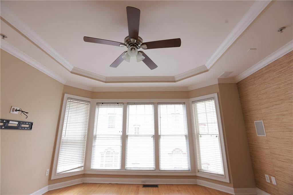 3541 Roswell Road Northeast, Unit 20 Atlanta, GA 30305 - Photo 31 of 72 a view of room with a ceiling fan