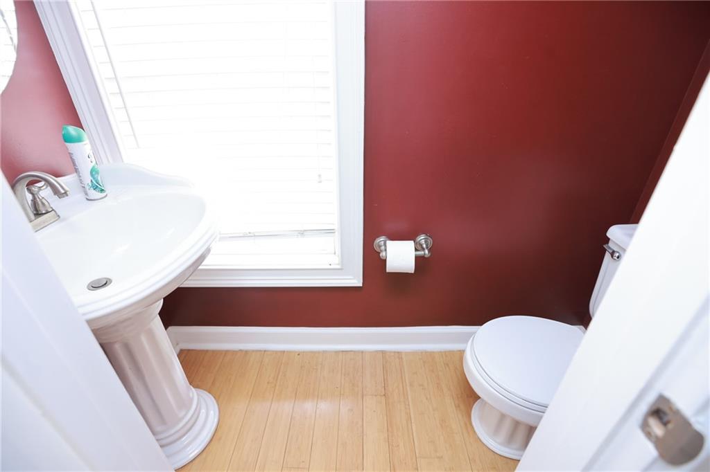 3541 Roswell Road Northeast, Unit 20 Atlanta, GA 30305 - Photo 58 of 72 a bathroom with a sink and a mirror