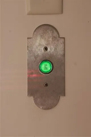 an empty room with wooden floor and closet