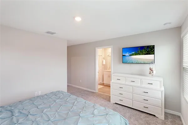 a view of room with cabinet and mirror
