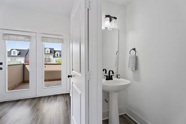 a bathroom with a sink and mirror