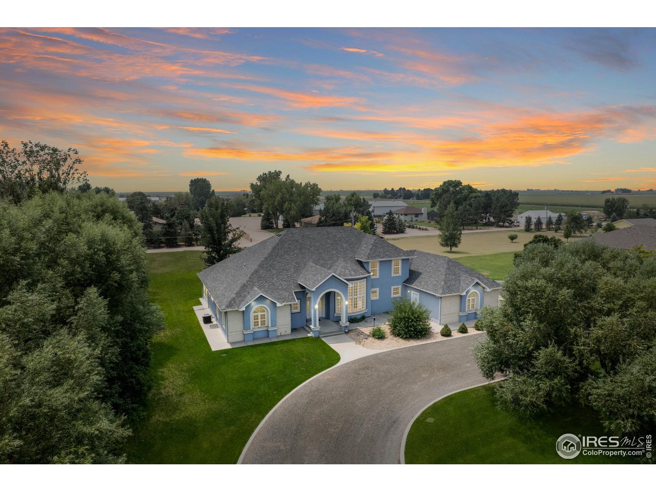 a view of a house with a big yard