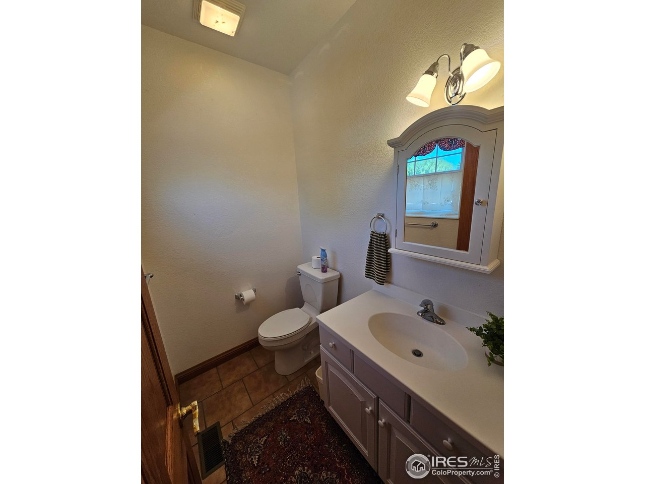17606 County Road Q Fort Morgan, CO 80701 - Photo 35 of 37 a bathroom with a sink and a toilet