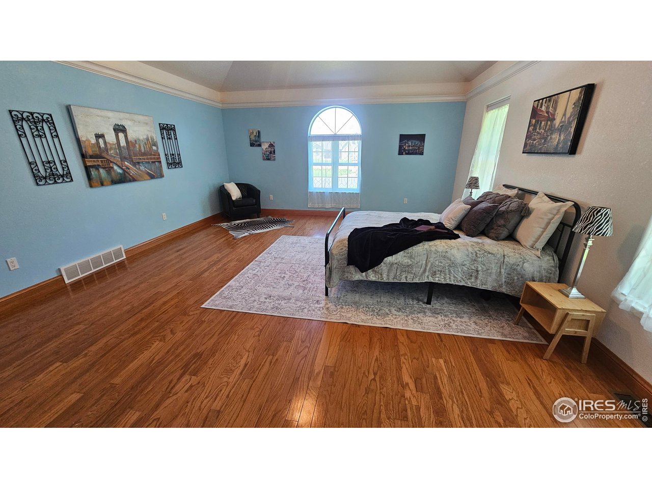 17606 County Road Q Fort Morgan, CO 80701 - Photo 4 of 37 a living room with furniture and a wooden floor