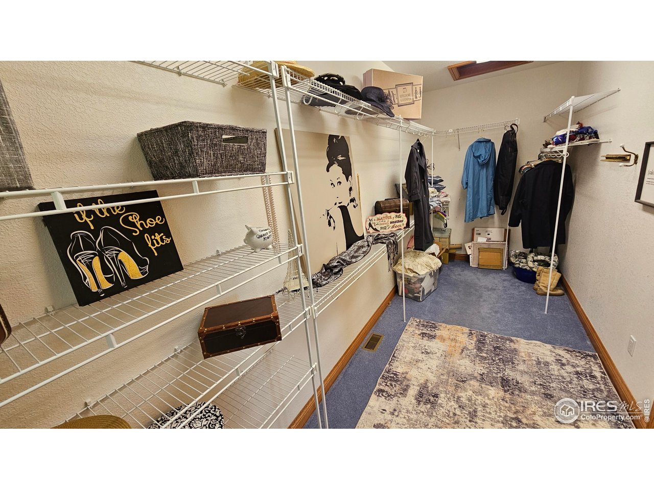 17606 County Road Q Fort Morgan, CO 80701 - Photo 8 of 37 a en suite bathroom with a sink and a mirror