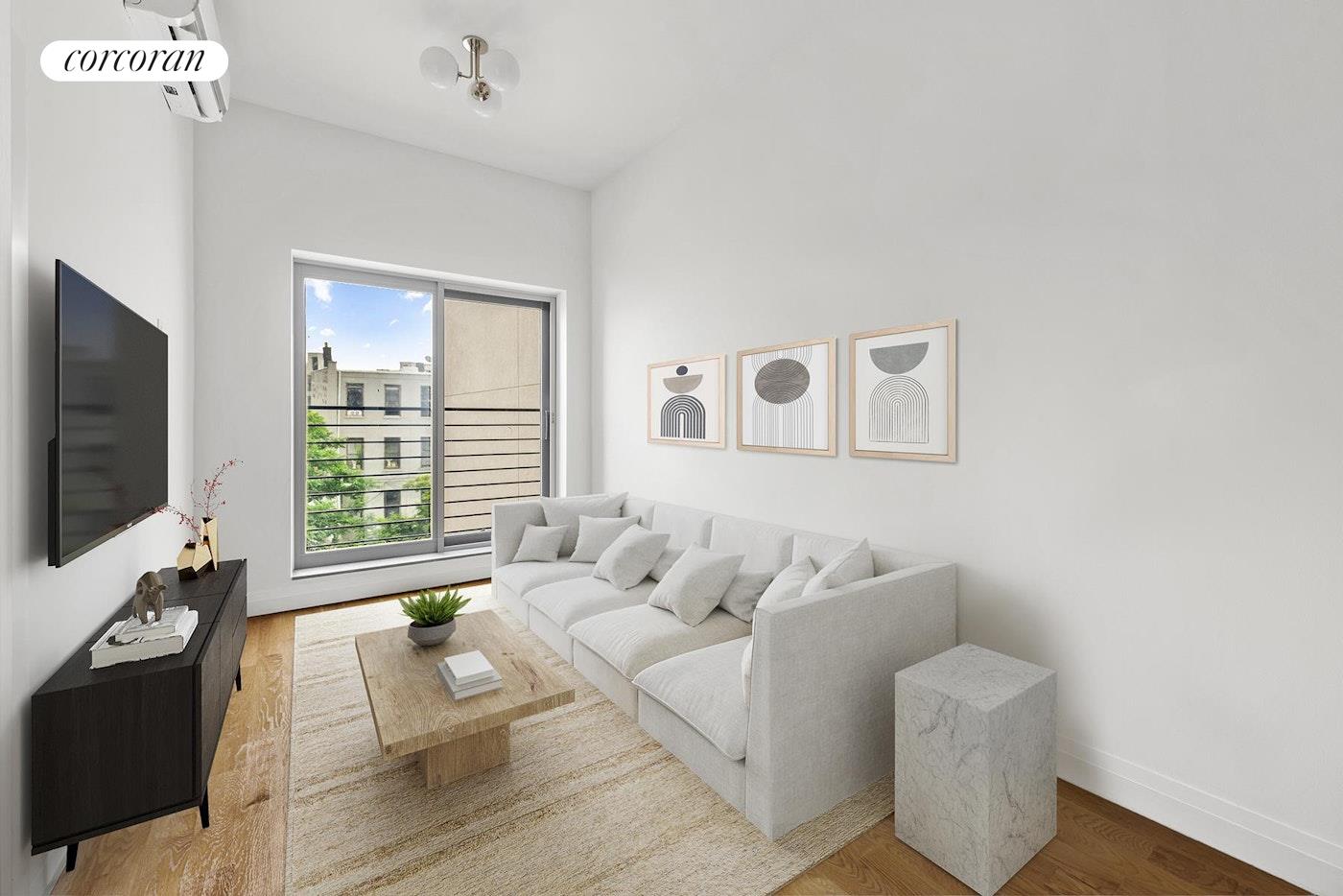 26 Goodwin Place, Unit 4R Brooklyn, NY 11221 - Photo 2 of 7 a living room with furniture and a flat screen tv