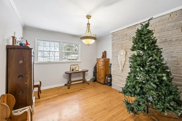 a bedroom that has a bed and a table in it