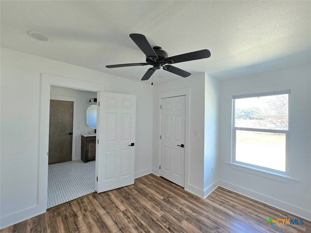 1005 Bridge Street Lampasas, TX 76550 - Photo 20 of 29 a view of an empty room with a window