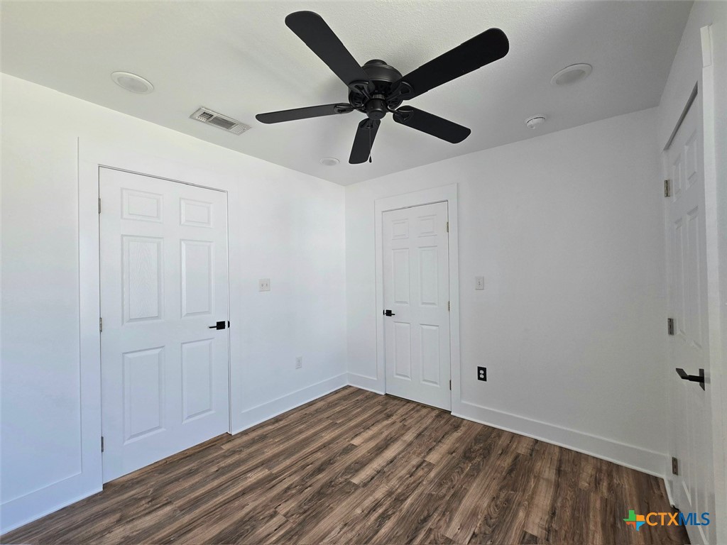 1005 Bridge Street Lampasas, TX 76550 - Photo 22 of 29 a view of empty room with wooden floor