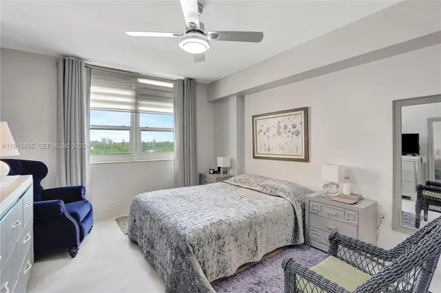 a bedroom with a bed furniture and a window