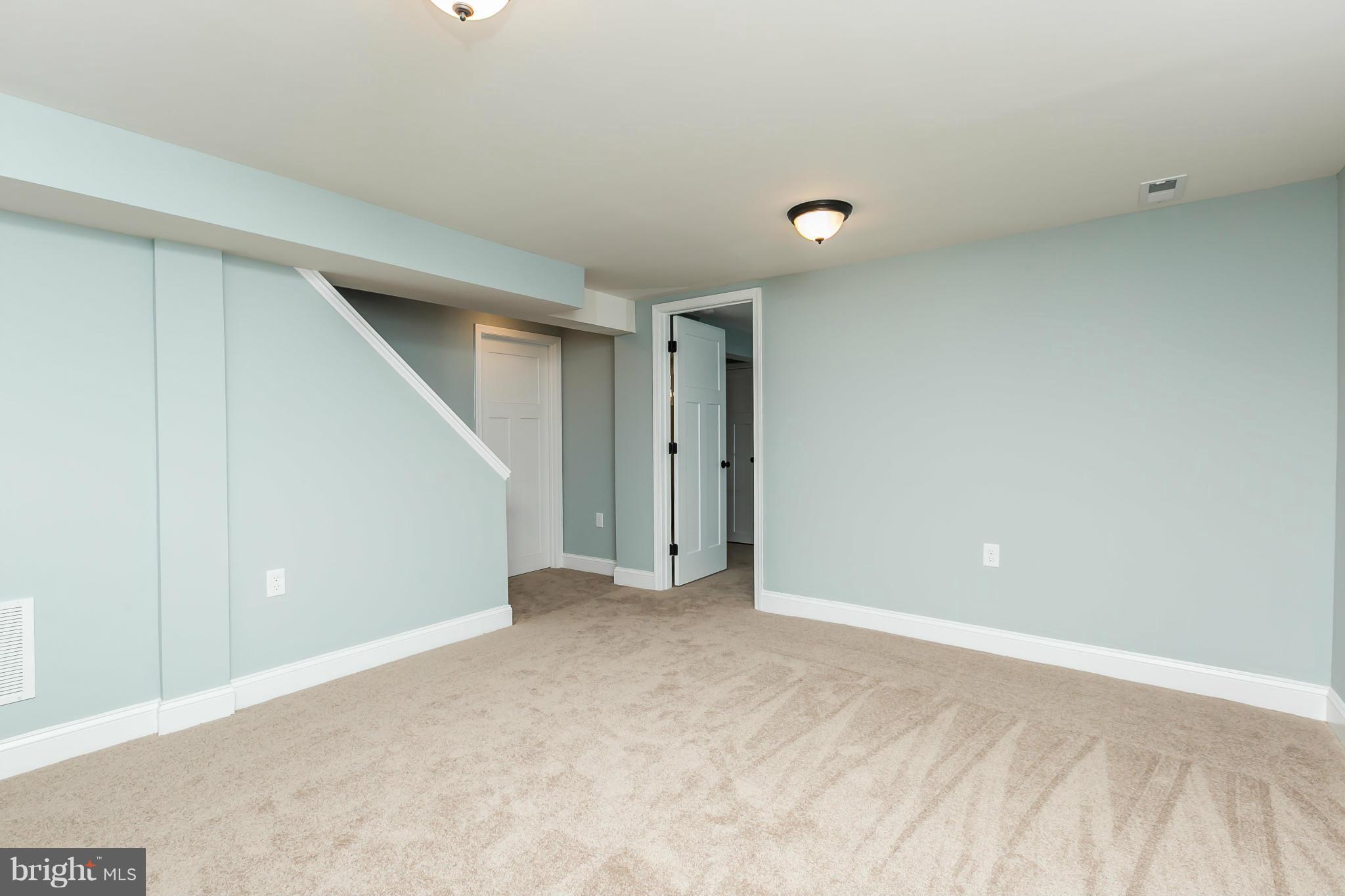 5504 Catalpha Road Baltimore, MD 21214 - Photo 23 of 28 a view of an empty room