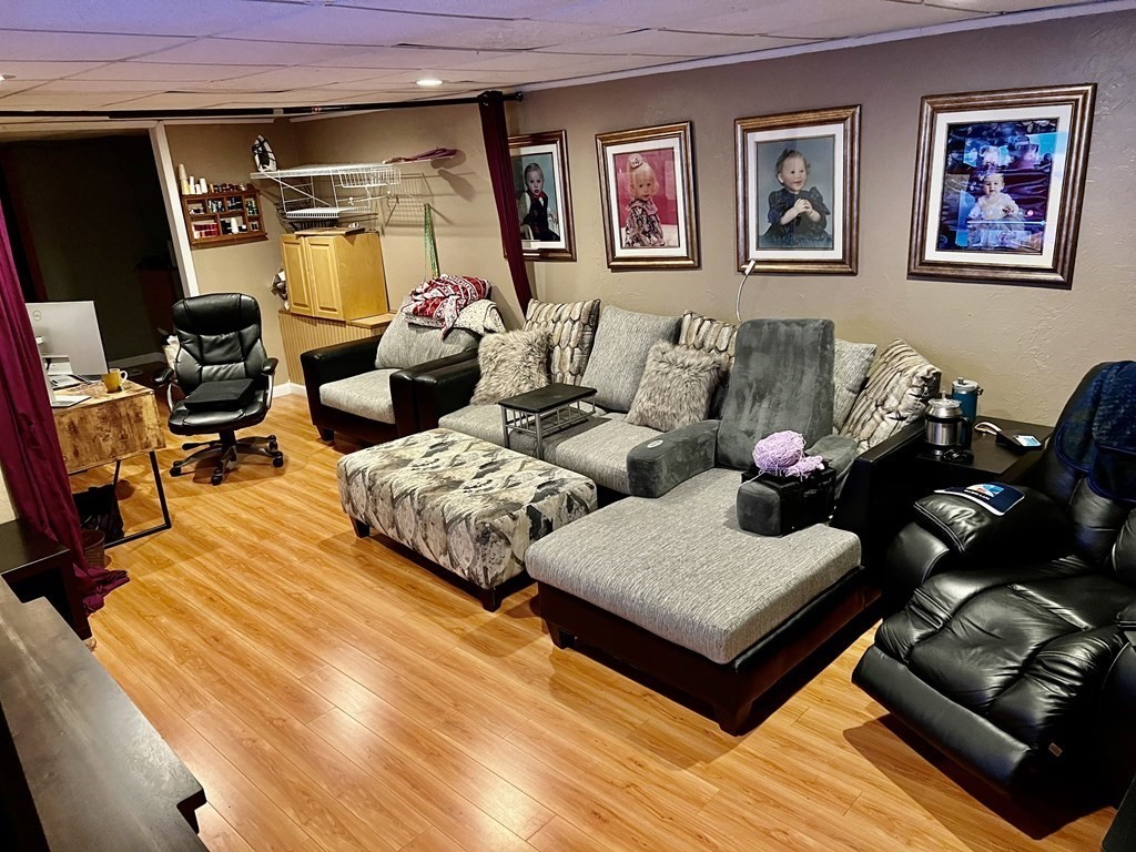 30 Tennyson Street Worcester, MA 01610 - Photo 14 of 19 a living room with furniture and a rug