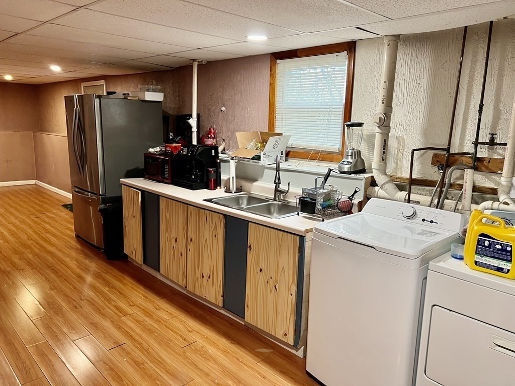 30 Tennyson Street Worcester, MA 01610 - Photo 17 of 19 a room with storage and utility