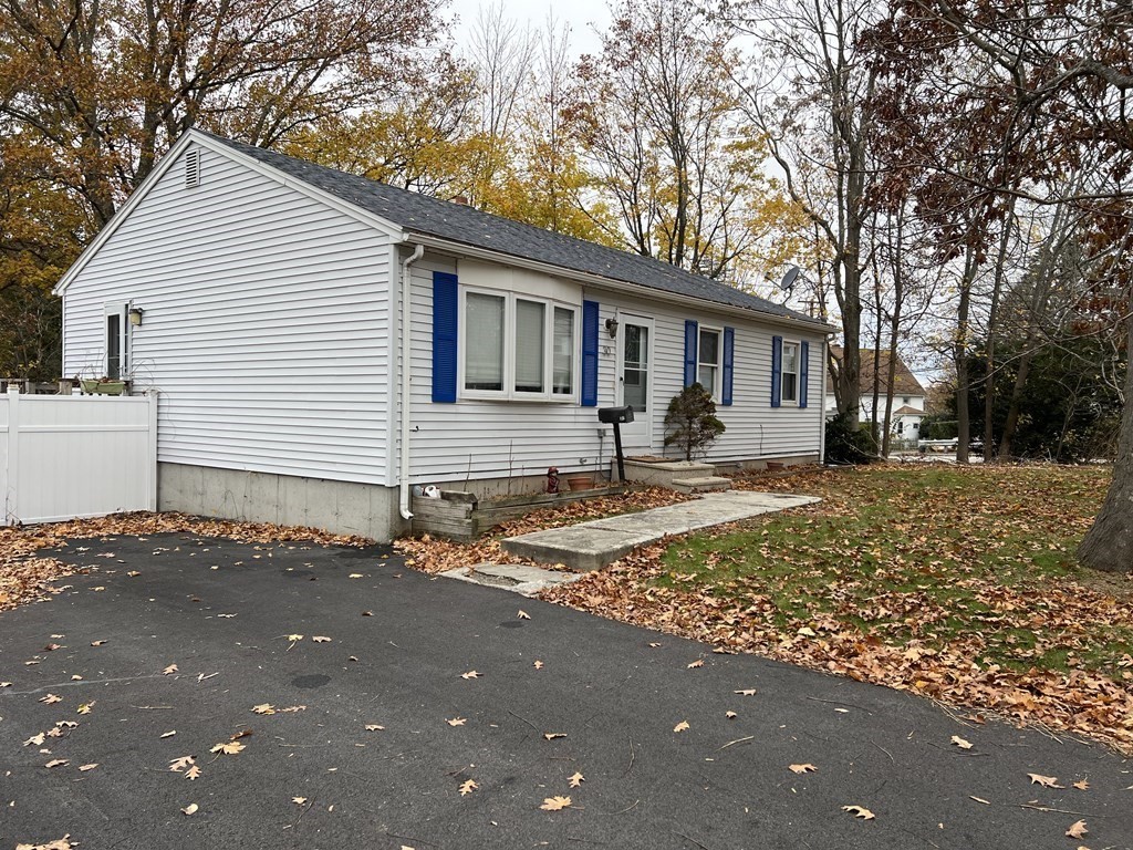 30 Tennyson Street Worcester, MA 01610 - Photo 2 of 19 a front view of a house with a yard