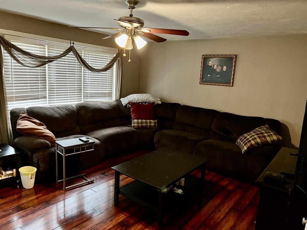 30 Tennyson Street Worcester, MA 01610 - Photo 6 of 19 a living room with furniture and a window